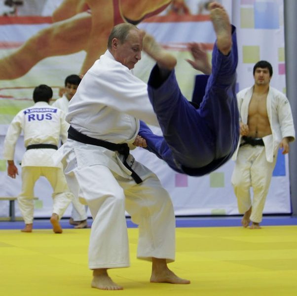 Vladimir Putin wrestles an opponent in Judo fight