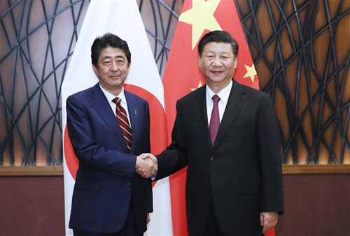 Shinzo Abe meets Xi Jinping